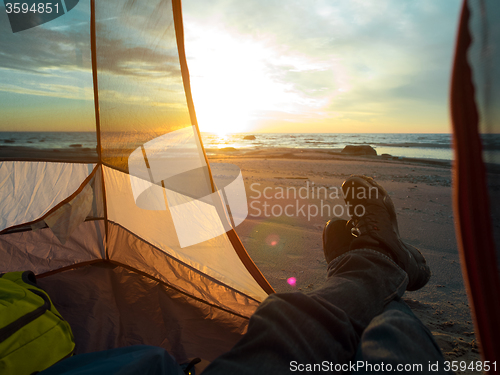 Image of Resting on sea after hiking 