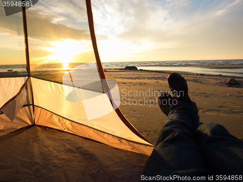 Image of Resting on sea after hiking 