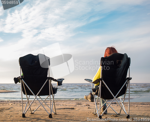 Image of woman sit on chair