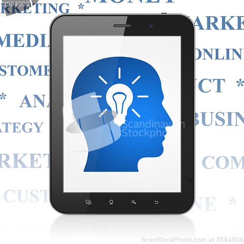 Image of Advertising concept: Tablet Computer with Head With Light Bulb on display
