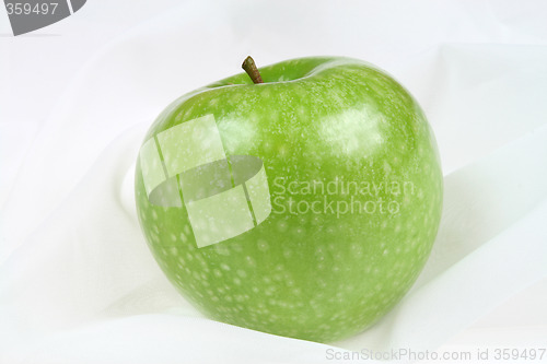 Image of Apple on textile background