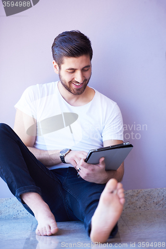 Image of student working on tablet