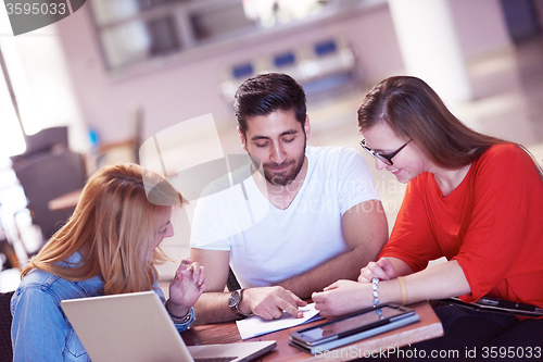 Image of students group working on school  project  together