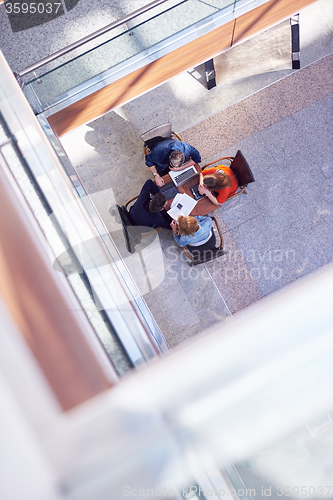 Image of students group working on school  project  together
