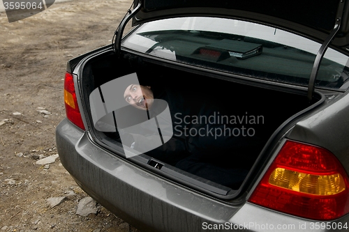 Image of Man in the trunk