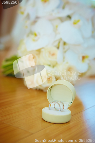 Image of wedding bouquet and rings