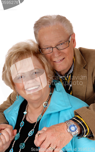 Image of Happy mature couple hugging.