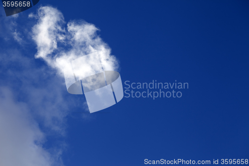 Image of Blue sky with little sunlight clouds