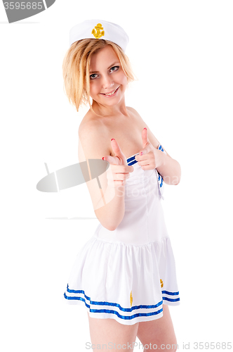 Image of Young beautiful sailor woman pointing forward