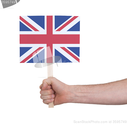 Image of Hand holding small card - Flag of the UK