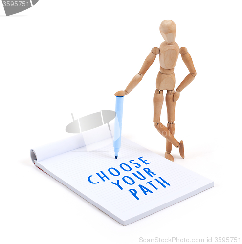Image of Wooden mannequin writing - Choose your path