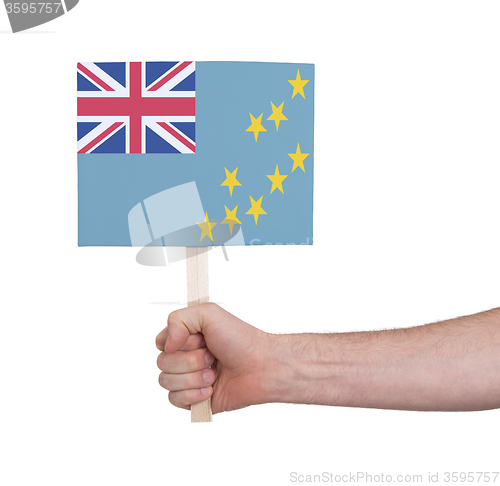 Image of Hand holding small card - Flag of Tuvalu