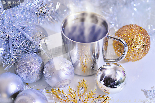 Image of Christmas decorations with a mug of hot coffee