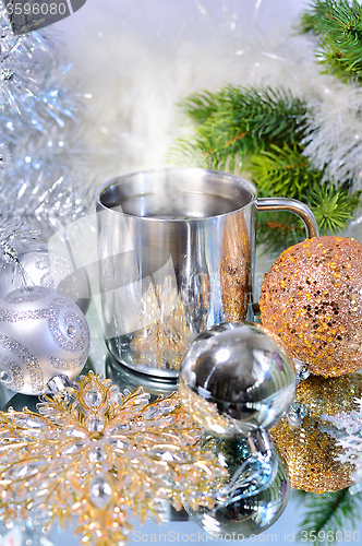 Image of Christmas decorations with a mug of hot coffee