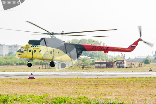 Image of Passenger helicopter MI-8 landing