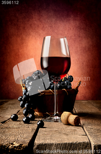 Image of Basket of grape and wine