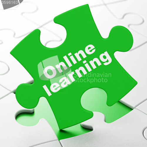 Image of Studying concept: Online Learning on puzzle background