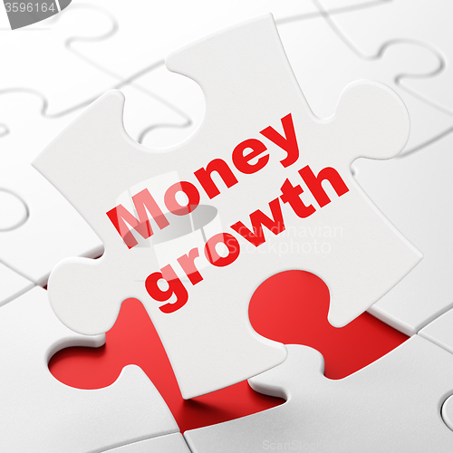 Image of Banking concept: Money Growth on puzzle background