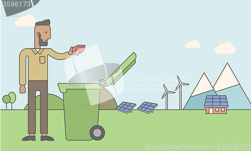 Image of Man with recycle bin.