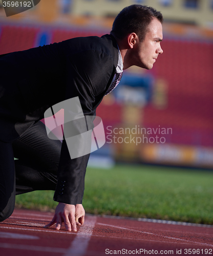 Image of business man ready to sprint