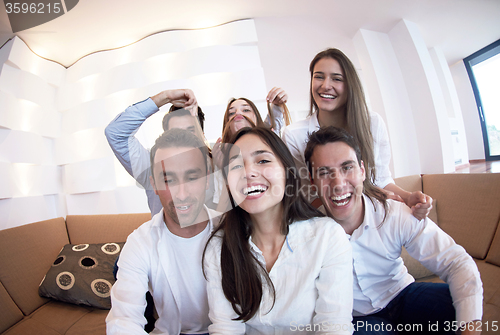 Image of group of friends taking selfie