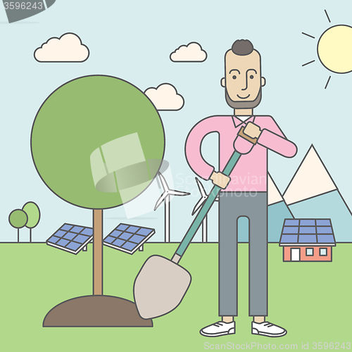 Image of Man plants tree.
