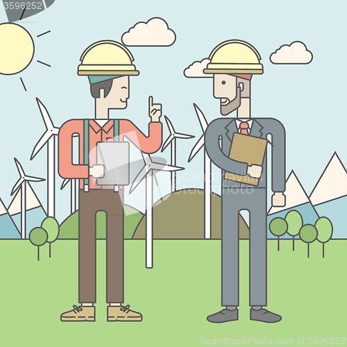 Image of Two man with wind turbines.