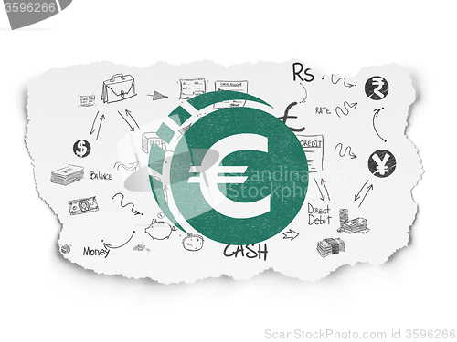 Image of Money concept: Euro Coin on Torn Paper background