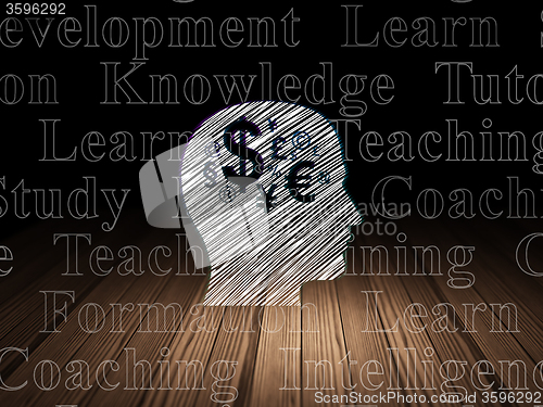 Image of Education concept: Head With Finance Symbol in grunge dark room
