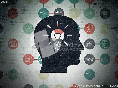Image of Advertising concept: Head With Light Bulb on Digital Paper background