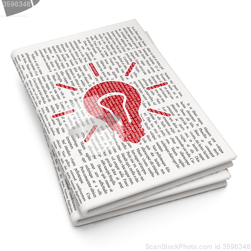 Image of Business concept: Light Bulb on Newspaper background