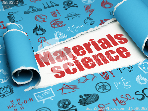 Image of Science concept: red text Materials Science under the piece of  torn paper
