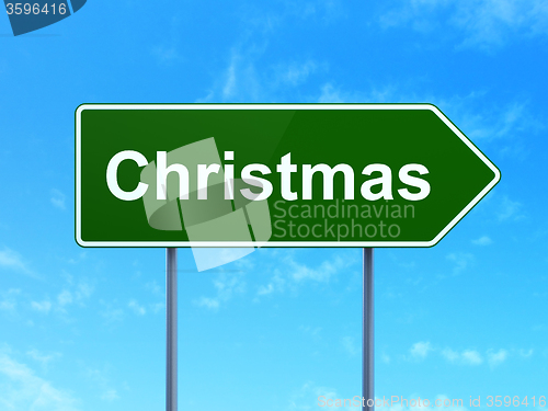Image of Entertainment, concept: Christmas on road sign background