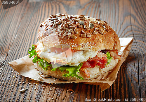 Image of healthy sandwich on wooden table