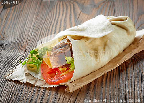 Image of wrap with beef and vegetables