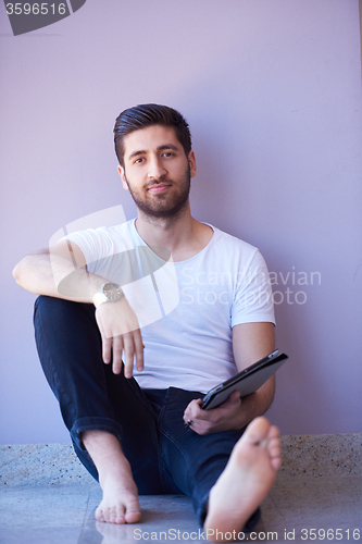 Image of student working on tablet