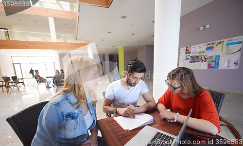 Image of students group working on school  project  together