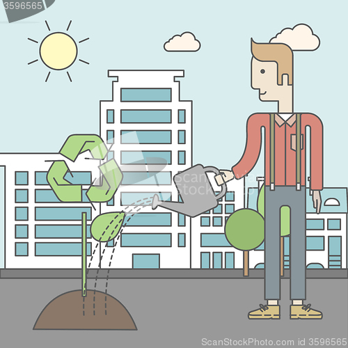 Image of Man watering tree.