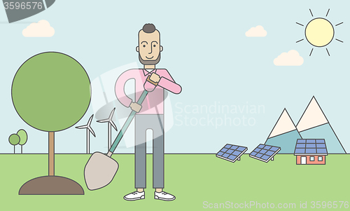 Image of Man plants tree.