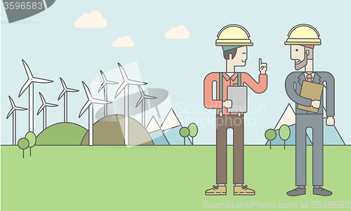 Image of Two man with wind turbines.