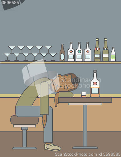 Image of Man sleeping in bar. 