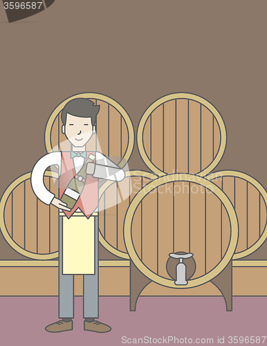 Image of Waiter in wine cellar.