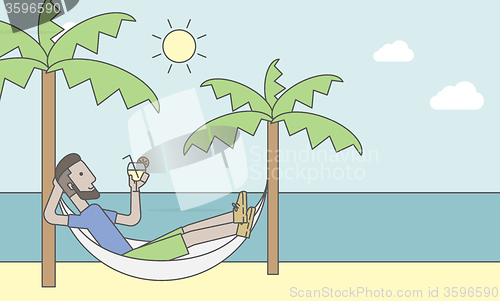 Image of Man chilling in hammock.