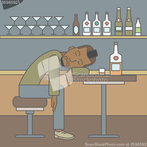 Image of Man sleeping in bar. 