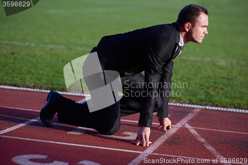 Image of business man ready to sprint