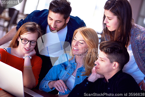 Image of students group working on school  project  together