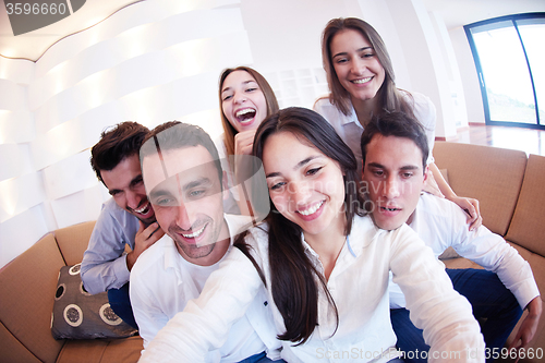 Image of group of friends taking selfie