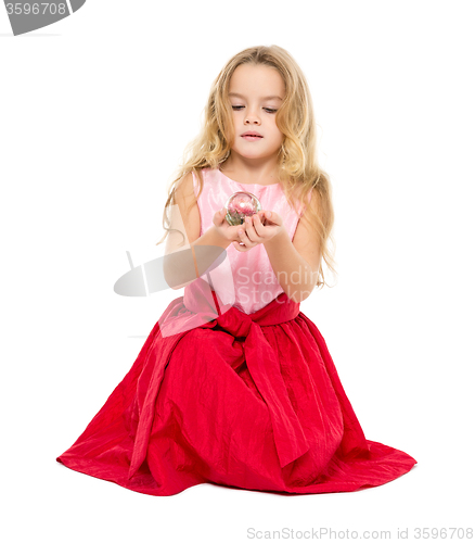 Image of Little Girl with Magic Ball Dreams