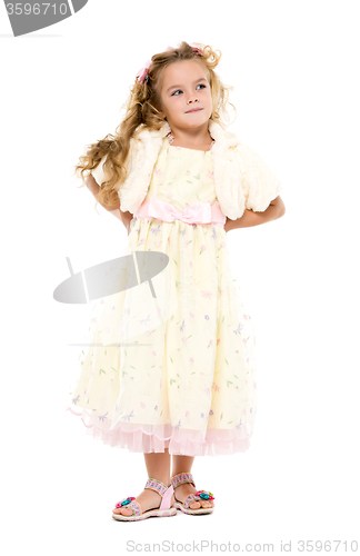 Image of Little Girl in a Light Dress Posing