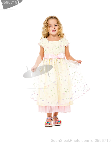 Image of Little Girl in a Light Dress Posing